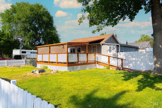 224 S Fern St, Nampa, ID 83686 - back of property featuring a wooden deck