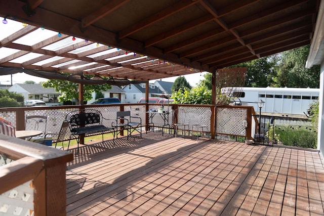 224 S Fern St, Nampa, ID 83686 - wooden deck featuring a pergola, a residential view, and outdoor dining space