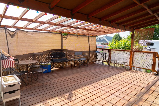 224 S Fern St, Nampa, ID 83686 - wooden terrace featuring a pergola and outdoor dining space