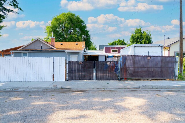 224 S Fern St, Nampa, ID 83686 - gate featuring a fenced front yard