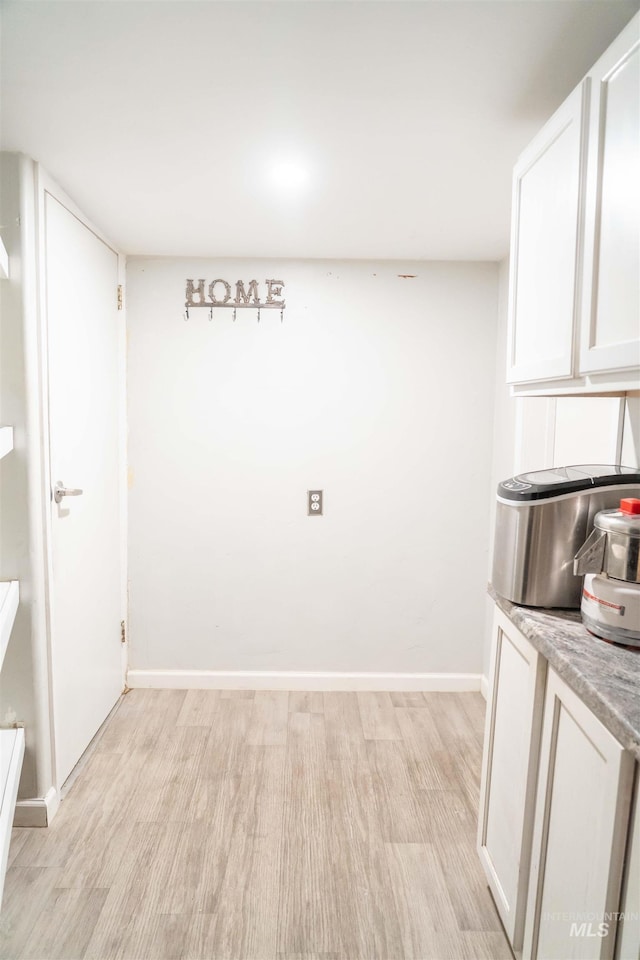 224 S Fern St, Nampa, ID 83686 - unfurnished dining area featuring light wood-type flooring and baseboards