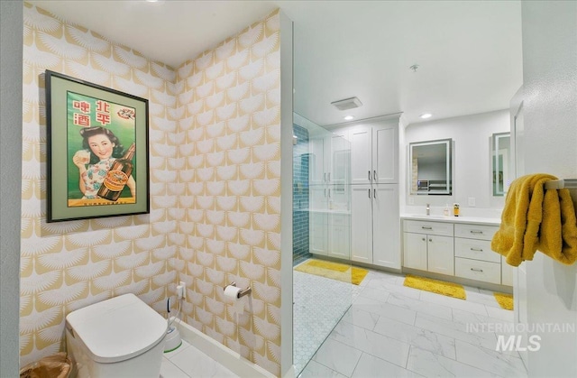 bathroom featuring walk in shower, vanity, toilet, marble finish floor, and recessed lighting