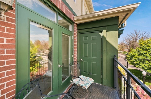 balcony featuring french doors