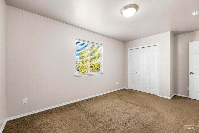 4618 Braeburn Ave, Caldwell, ID 83607 - unfurnished bedroom featuring carpet flooring and a closet