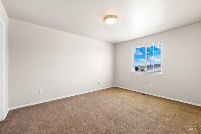 4618 Braeburn Ave, Caldwell, ID 83607 - unfurnished room with carpet flooring and baseboards