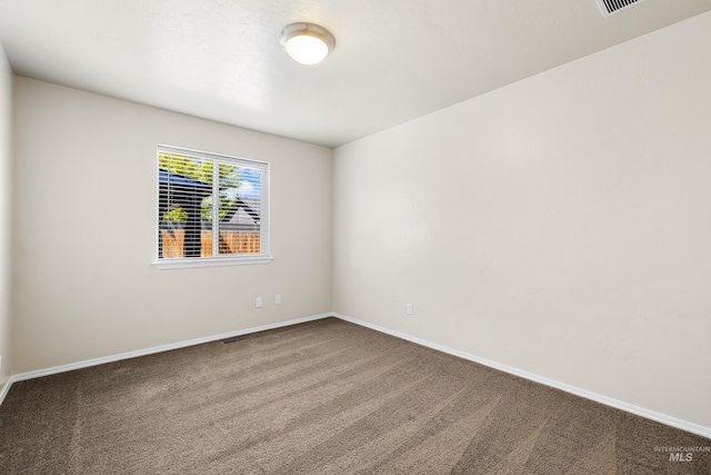 4618 Braeburn Ave, Caldwell, ID 83607 - empty room with carpet floors and baseboards