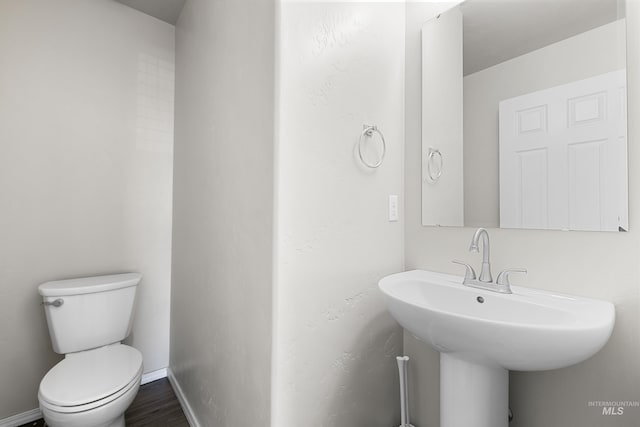 4618 Braeburn Ave, Caldwell, ID 83607 - half bath featuring toilet and baseboards