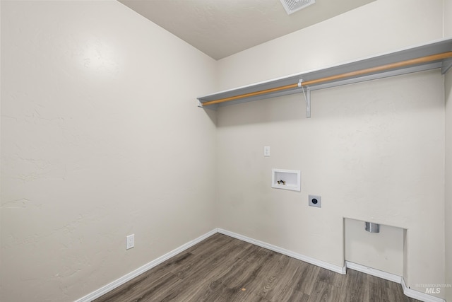 4618 Braeburn Ave, Caldwell, ID 83607 - laundry area with hookup for a washing machine, dark wood finished floors, and electric dryer hookup