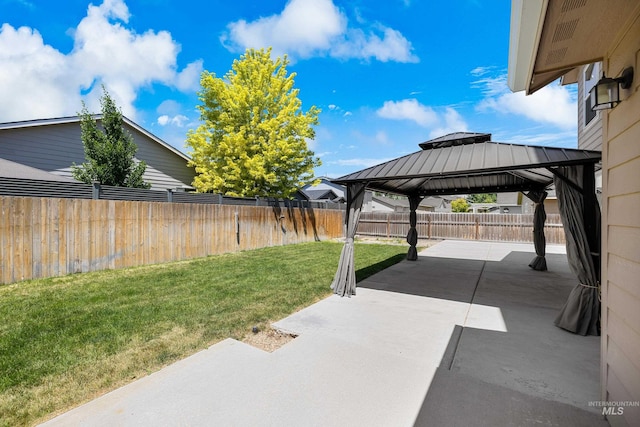 4618 Braeburn Ave, Caldwell, ID 83607 - fenced backyard featuring a gazebo and a patio