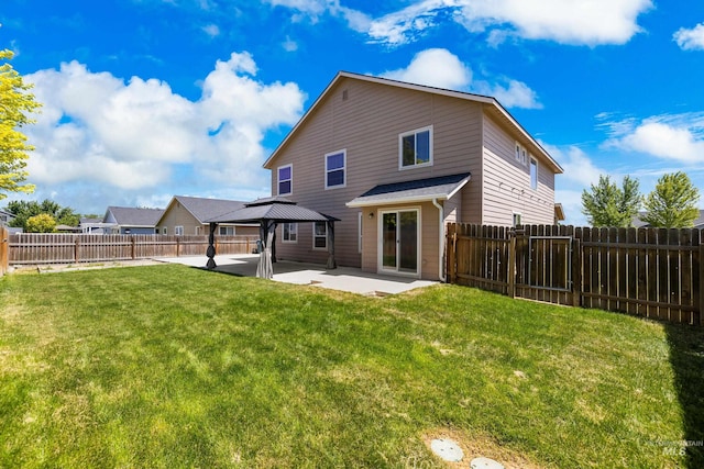 4618 Braeburn Ave, Caldwell, ID 83607 - rear view of property featuring a patio, a fenced backyard, and a gazebo