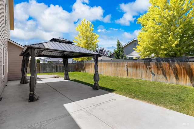 4618 Braeburn Ave, Caldwell, ID 83607 - fenced backyard featuring a gazebo and a patio area