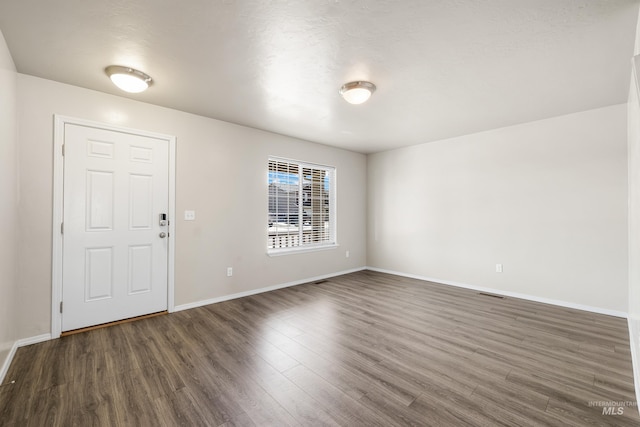4618 Braeburn Ave, Caldwell, ID 83607 - foyer entrance featuring wood finished floors and baseboards