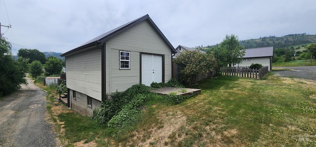 817 6th St, Kamiah, ID 83536 - view of property exterior with an outbuilding