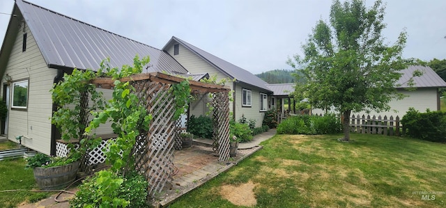 817 6th St, Kamiah, ID 83536 - view of side of home with metal roof