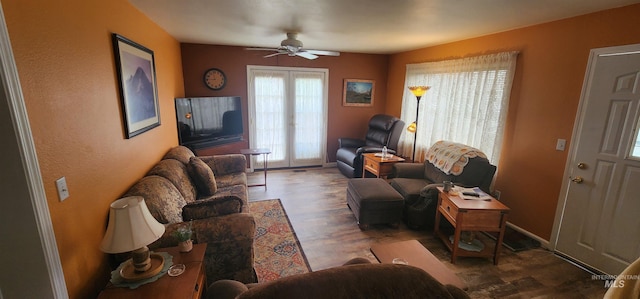 817 6th St, Kamiah, ID 83536 - living area with a ceiling fan and wood finished floors