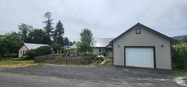 817 6th St, Kamiah, ID 83536 - single story home featuring metal roof and a garage