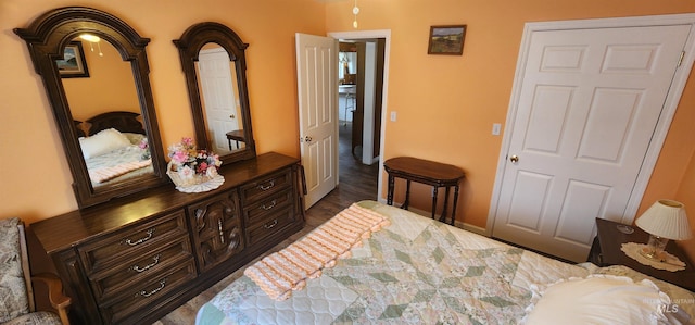 817 6th St, Kamiah, ID 83536 - bedroom with dark wood finished floors and baseboards