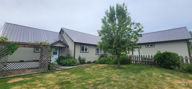 817 6th St, Kamiah, ID 83536 - rear view of property featuring metal roof