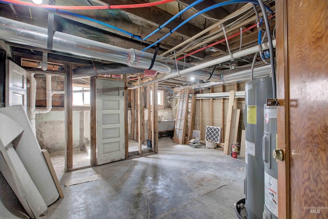 below grade area featuring water heater