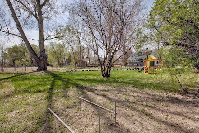 view of yard with a playground