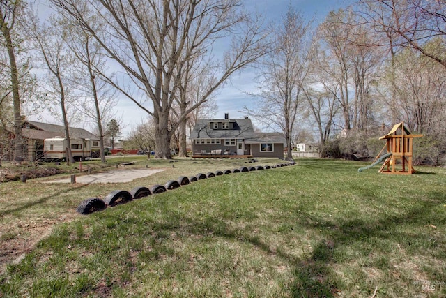 view of yard with a playground