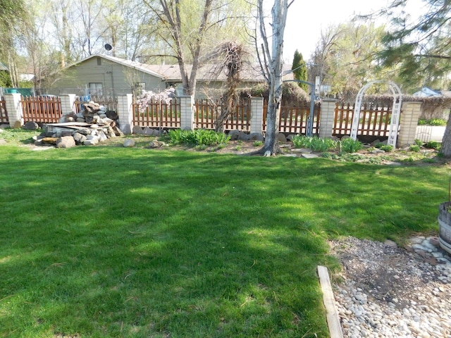view of yard with fence