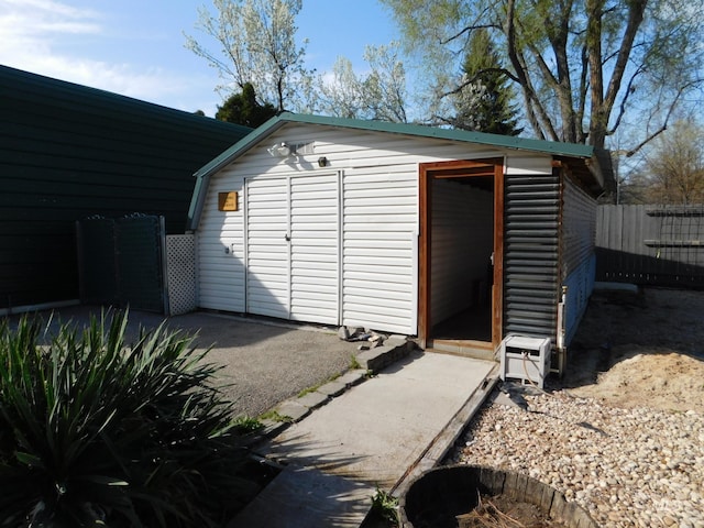 garage featuring fence