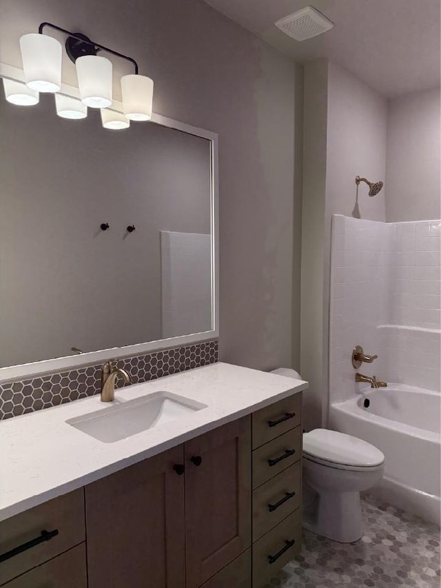 6671 W Mattawa Dr, Meridian, ID 83646 - full bath with vanity, bathtub / shower combination, decorative backsplash, and tile patterned floors