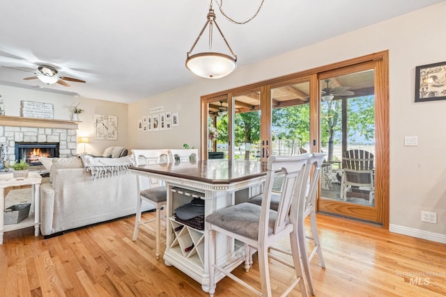 4459 E Deer Flt, Kuna, ID 83634 - dining space featuring a ceiling fan, plenty of natural light, and light wood-type flooring
