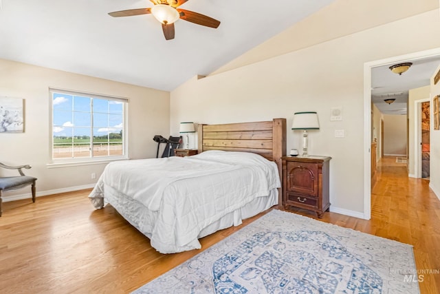 4459 E Deer Flt, Kuna, ID 83634 - bedroom with vaulted ceiling, light wood-style floors, and ceiling fan
