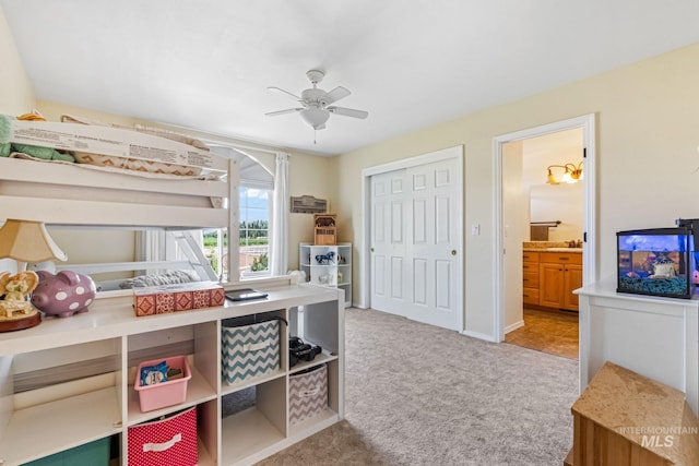 4459 E Deer Flt, Kuna, ID 83634 - bedroom featuring carpet flooring, a closet, ensuite bath, and a ceiling fan