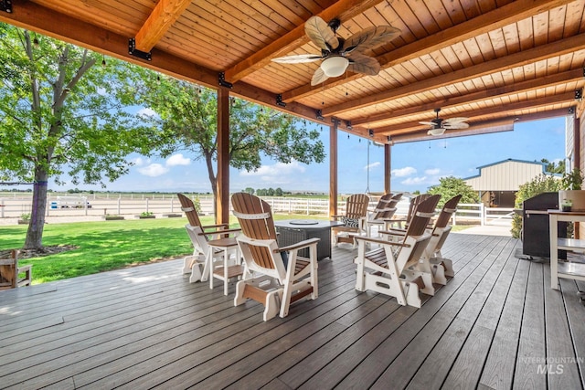 4459 E Deer Flt, Kuna, ID 83634 - wooden terrace with ceiling fan, a fire pit, and area for grilling