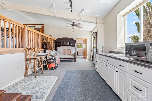 4459 E Deer Flt, Kuna, ID 83634 - bedroom with dark colored carpet and lofted ceiling