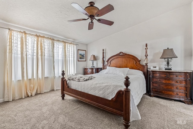 4459 E Deer Flt, Kuna, ID 83634 - carpeted bedroom featuring a ceiling fan and a textured ceiling