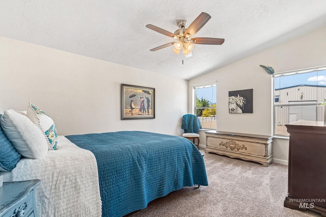 4459 E Deer Flt, Kuna, ID 83634 - carpeted bedroom with a textured ceiling, vaulted ceiling, and ceiling fan