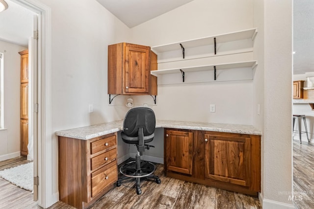4459 E Deer Flt, Kuna, ID 83634 - home office featuring built in study area and wood finished floors
