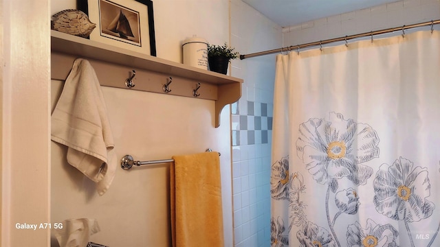 bathroom featuring curtained shower