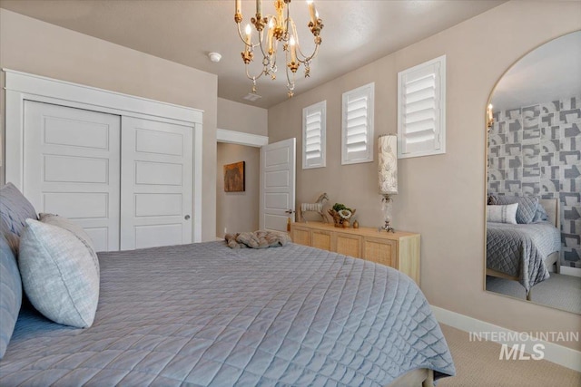 4772 W Barnview Dr, Boise, ID 83614 - carpeted bedroom featuring a chandelier, a closet, and arched walkways