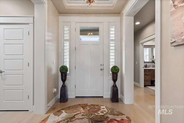 4772 W Barnview Dr, Boise, ID 83614 - entryway featuring wood finished floors, healthy amount of natural light, baseboards, and recessed lighting