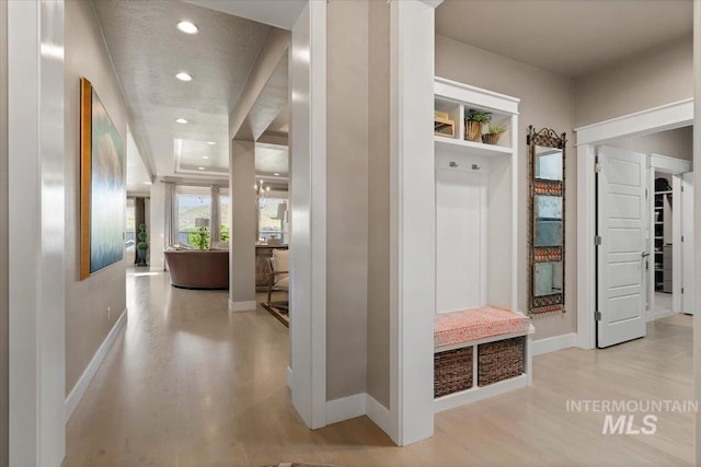4772 W Barnview Dr, Boise, ID 83614 - mudroom featuring wood finished floors, baseboards, and recessed lighting