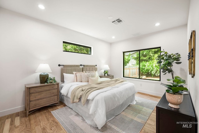 1435 N Garden, Boise, ID 83706 - bedroom featuring baseboards, light wood-style floors, and recessed lighting