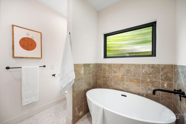 1435 N Garden, Boise, ID 83706 - bathroom with a freestanding tub, tile patterned floors, and tile walls