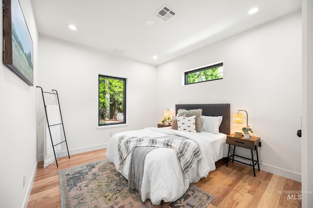 1435 N Garden, Boise, ID 83706 - bedroom featuring light wood-style flooring, recessed lighting, and baseboards