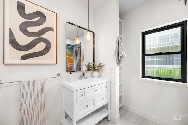 1435 N Garden, Boise, ID 83706 - bathroom with baseboards and vanity