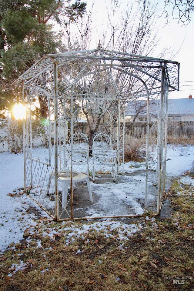 view of yard layered in snow