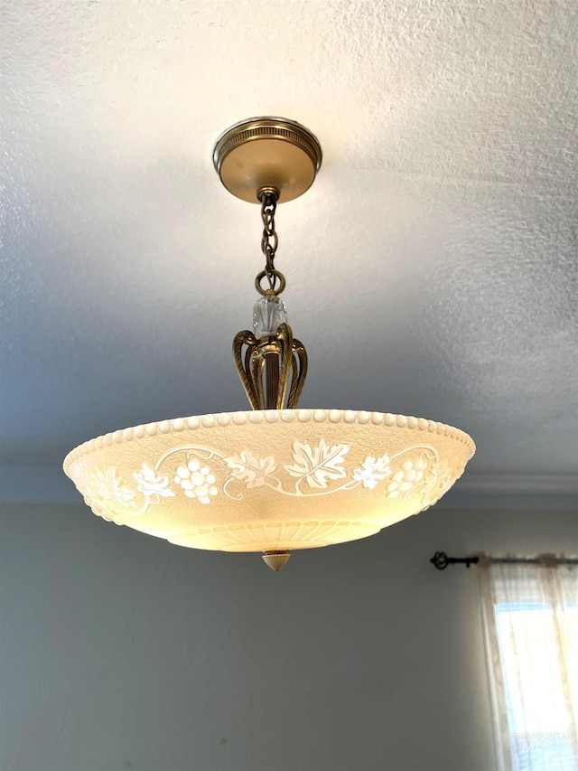 details featuring a textured ceiling