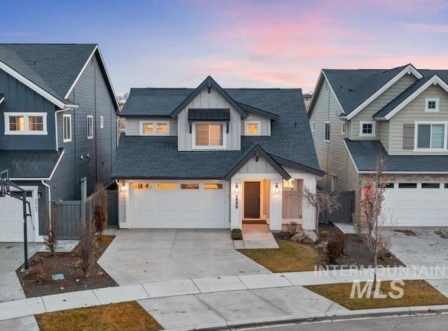 view of front of property with a garage