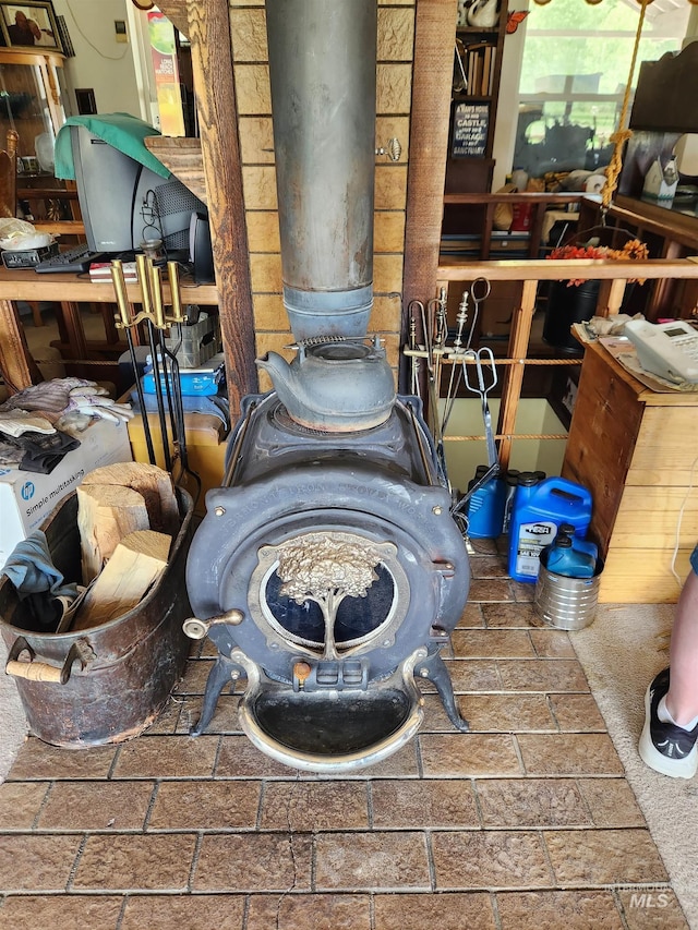 4942 E Baumgartner Rd, Featherville, ID 83647 - detailed view of a wood stove