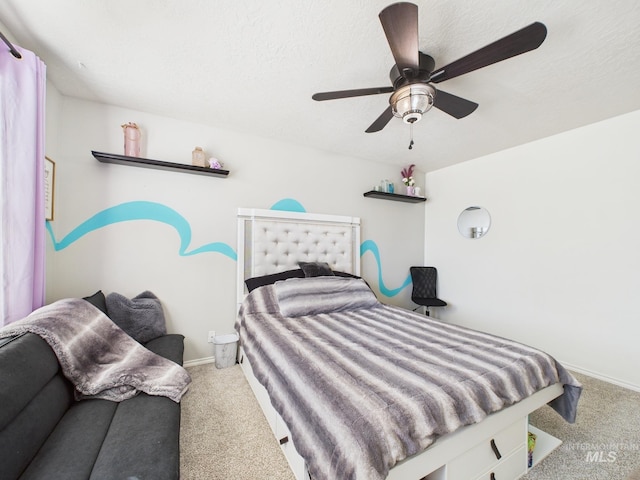 bedroom featuring carpet, baseboards, and ceiling fan