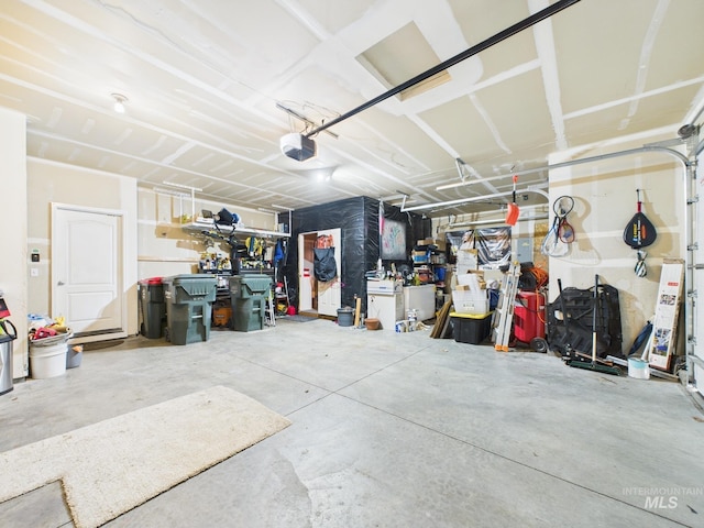 garage featuring a garage door opener